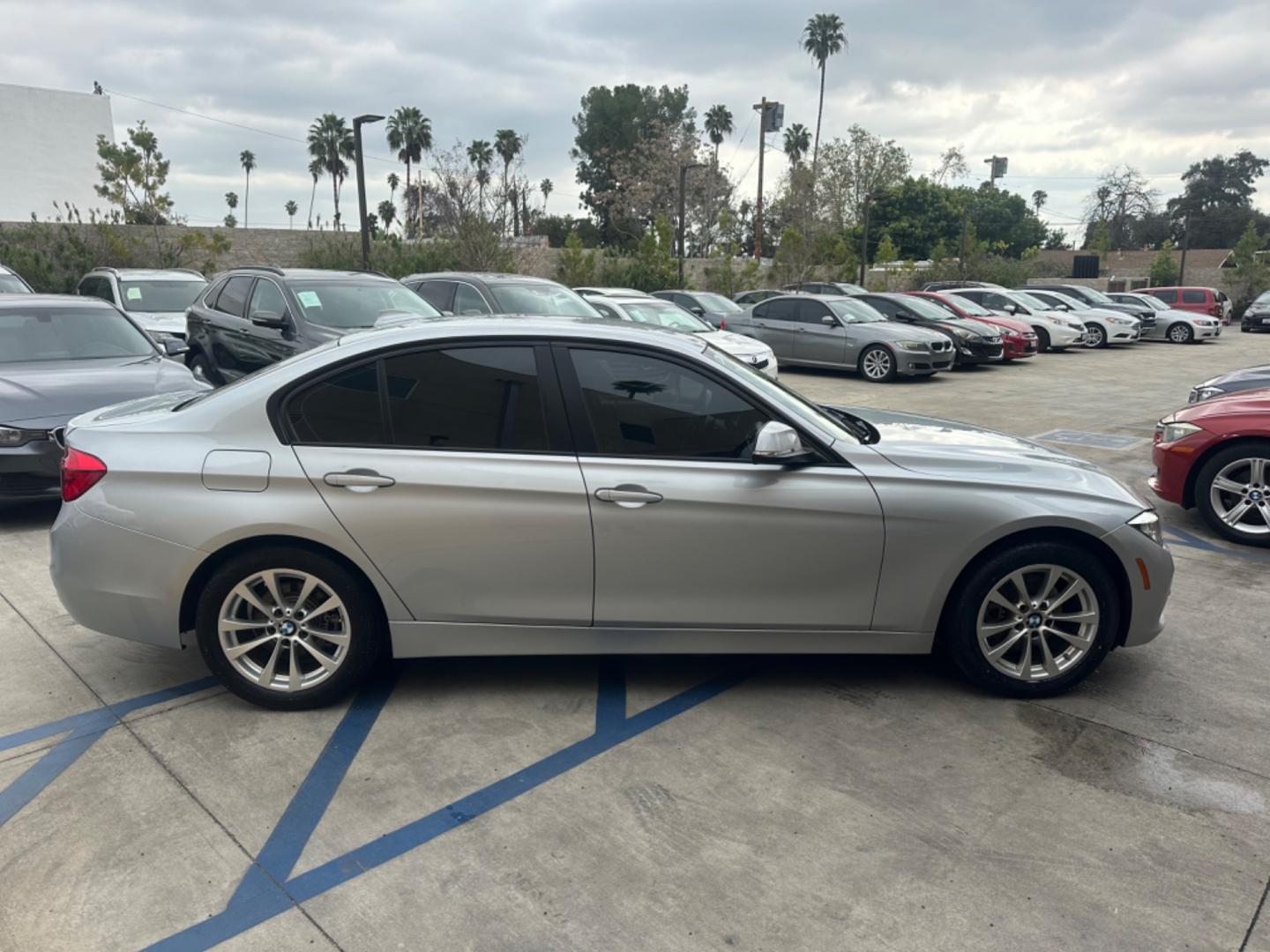 2017 Gray /Black BMW 3-Series Leather (WBA8E1G34HN) with an 4 Cylinder engine, Automatic transmission, located at 30 S. Berkeley Avenue, Pasadena, CA, 91107, (626) 248-7567, 34.145447, -118.109398 - Low Miles!! This 2017 BMW 3-Series 320i Sedan looks and drives well. Looking for a top-notch sedan in Pasadena, CA? Your search ends here! Feast your eyes on our remarkable 2017 BMW 3-Series 320i Sedan with only 54,413 miles on the odometer. This is considered low mileage, providing assurance of its - Photo#6